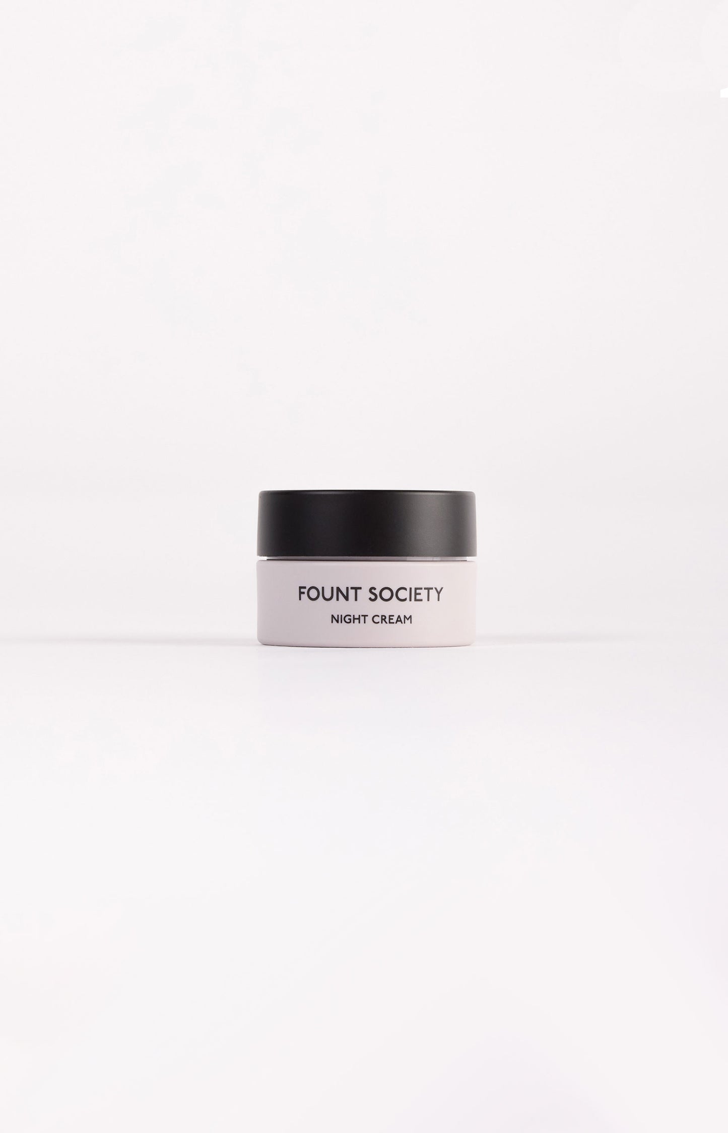 The Fount Society Night Cream mini container sits in front of a white background. |Size:Mini