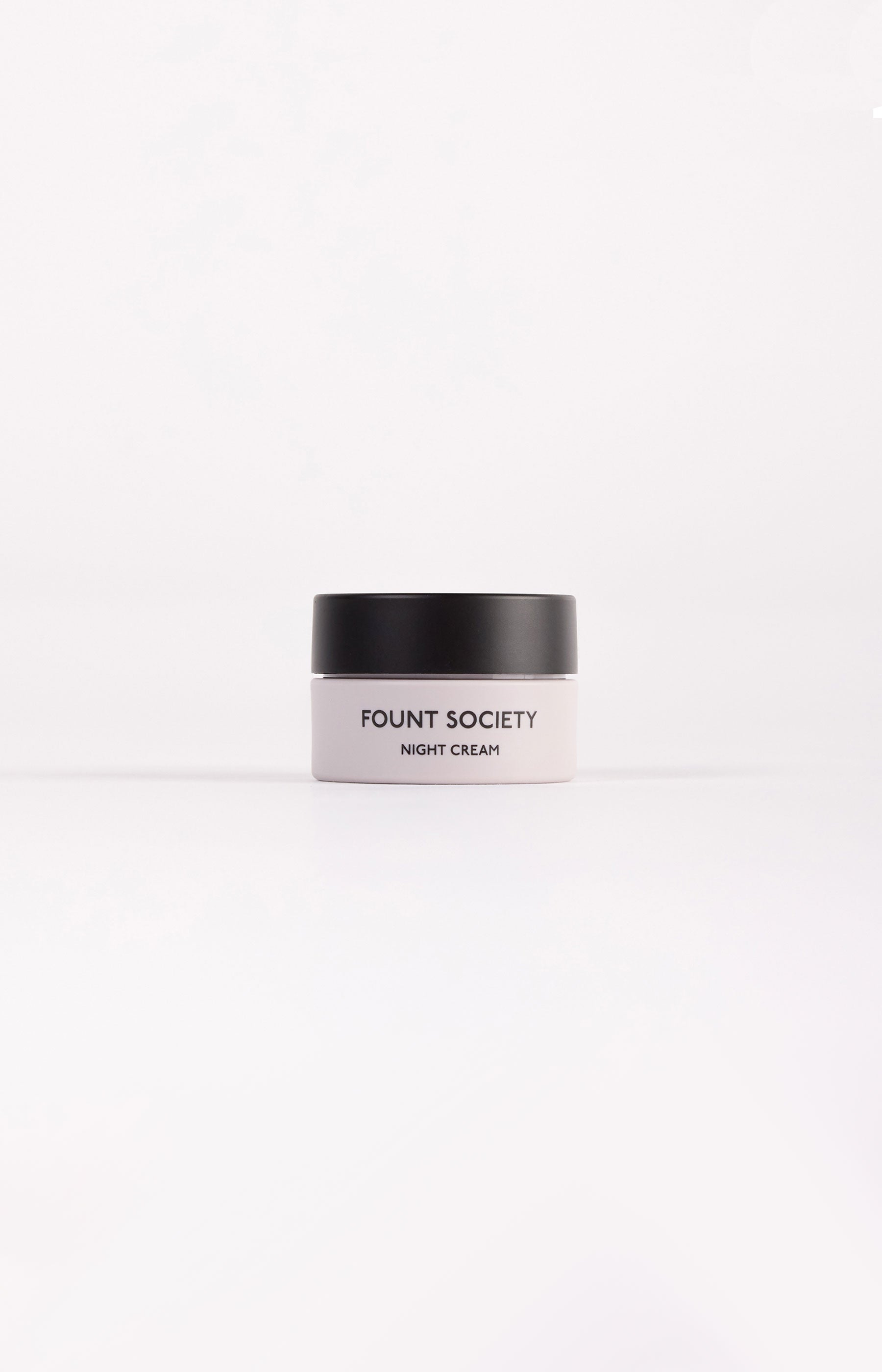 The Fount Society Night Cream mini container sits in front of a white background. |Size:Mini