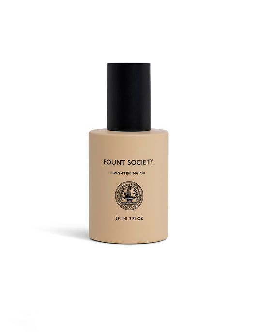 Brightening Vitamin C Oil in beige bottle with black cap