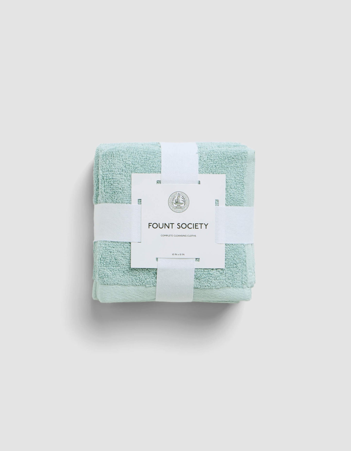 A stack of 4 teal washcloths wrapped in packaging |Color:Tide