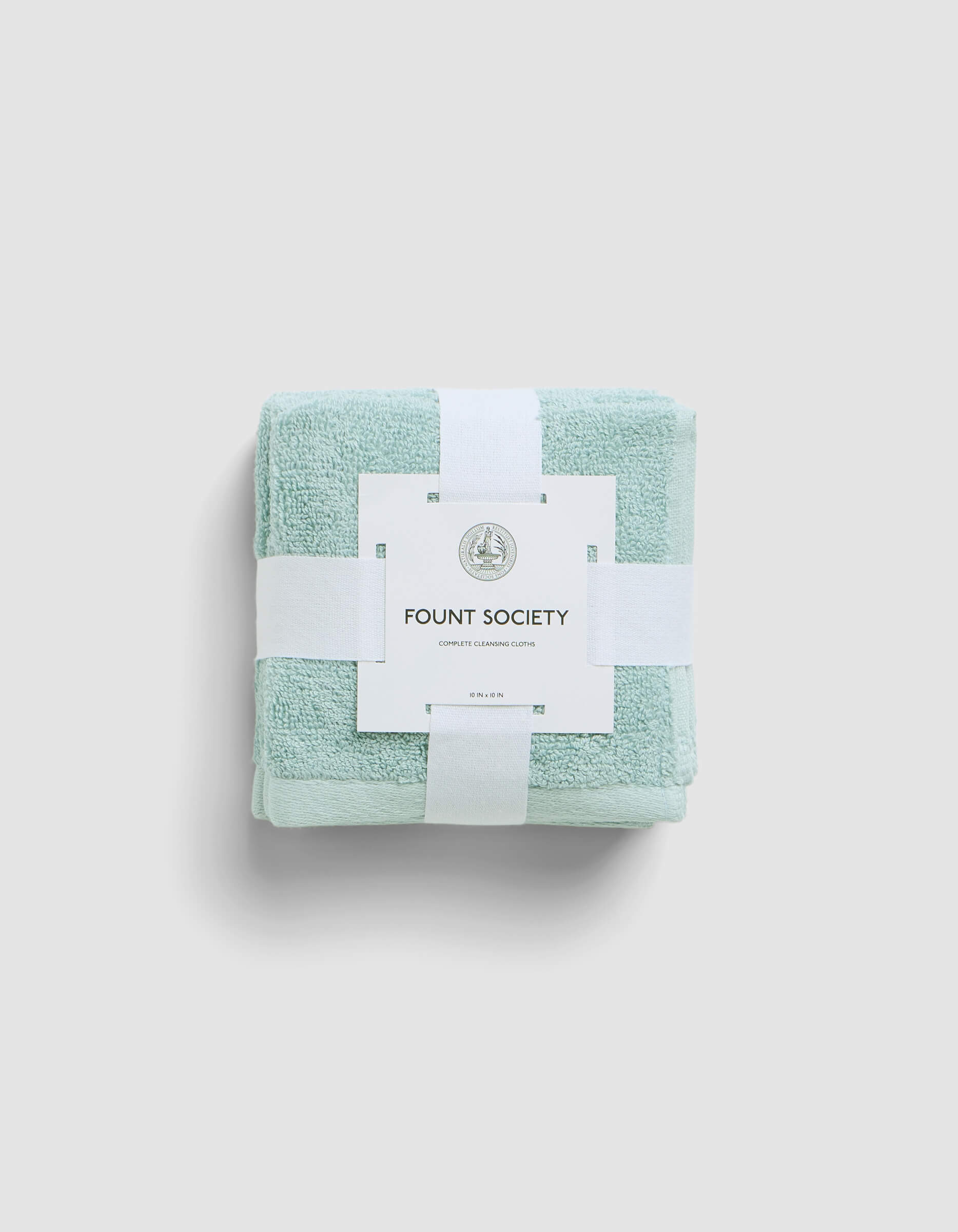 A stack of 4 teal washcloths wrapped in packaging |Color:Tide